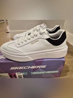 Skechers White Sneakers with Black Heel Accent